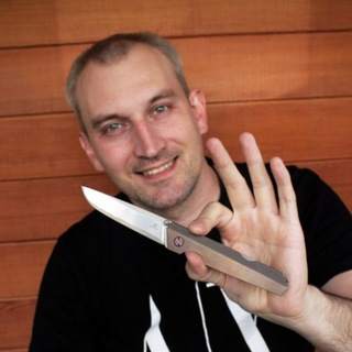 Логотип @ax_knives - KHOMUTOV