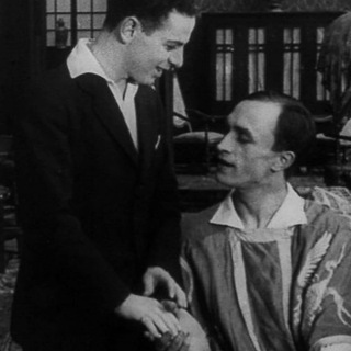 Логотип @booksandwinecollection - Wilde Bookshop and hyacinths