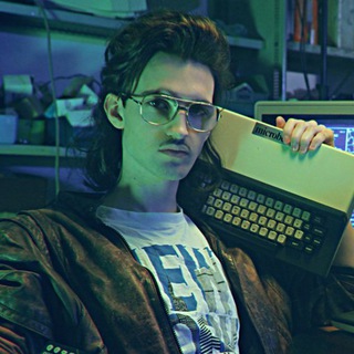 Логотип @imuzzik - Digital гик. Цифровые технологии