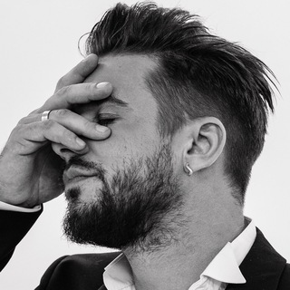 Логотип @john_tomsky_official - 𝕁𝕆ℍℕ 𝕋𝕆𝕄𝕊𝕂𝕐