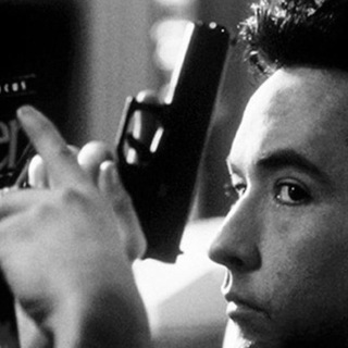 Логотип @oneday_onefilm - По фильму в день