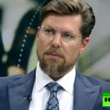 Логотип @rtrihla - برنامج رحلة في الذاكرة - RT Arabic