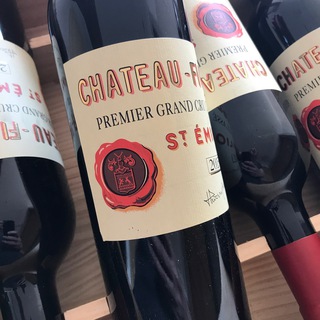 Логотип @rwexchange - Addicted to wine.