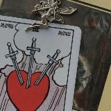 Логотип @zaykinotaro - таро у заи